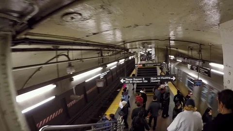 Descending Stairs To Train Platform As New York Subway Arrives Stock Footage 73611666