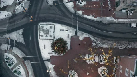 Descending top down aerial of decorated Christmas tree and lights in Stock Footage 152653790