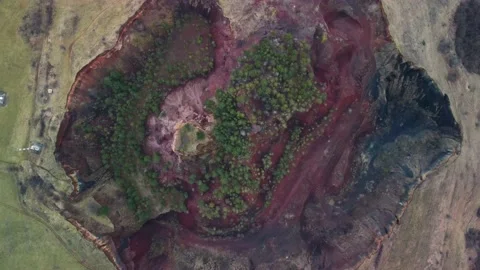 Descending Top down aerial view of Racos Volcano Crater Stock Footage 230125146