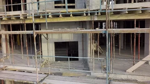Descending view of a high rise building construction site Stock Footage 346410502