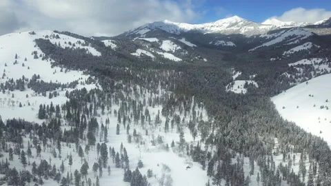 Descending in the winter mountains Stock Footage 268358979