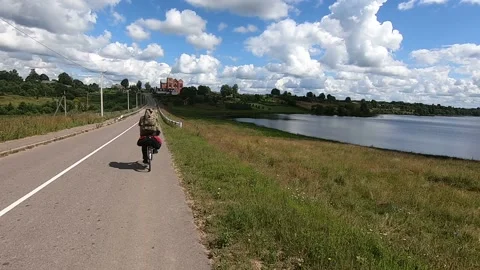 Descent by bicycle. Beautiful Belarusian village of Rositsa. Stock Footage