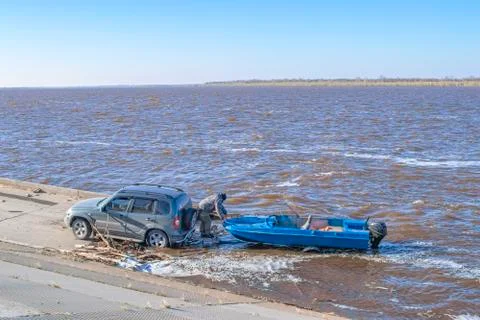 The descent of the boat into the water. Stock Photos