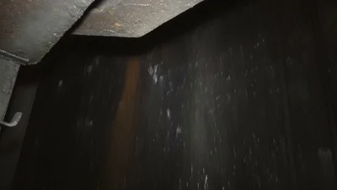 Descent into a coal mine in an elevator cage Stock Footage 83230444