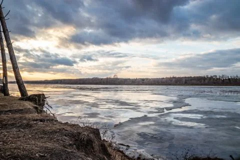 The descent of ice in the spring on the river in March is a natural phenomeno Stock Photos