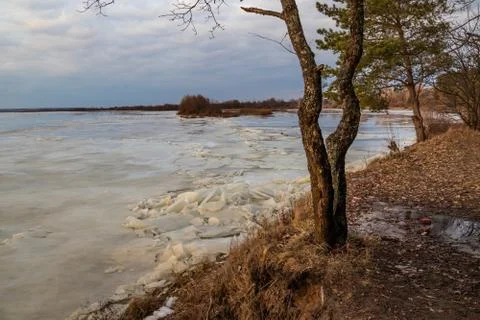 The descent of ice in the spring on the river in March is a natural phenomeno Stock Photos