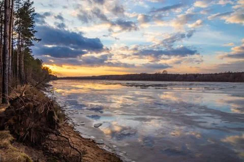 The descent of ice in the spring on the river in March is a natural phenomeno Stock Photos