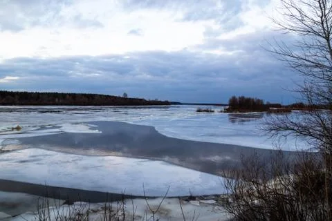 The descent of ice in the spring on the river in March is a natural phenomeno Stock Photos