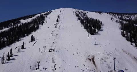 The descent from the mountain on a snowboard 스톡 동영상 113077066