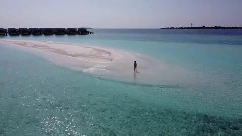 Descent to Paradise: A Dramatic Aerial Dive in the Maldives Video stock 264050504