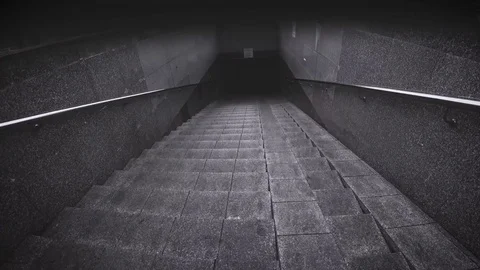 Descent on the steps in motion to the underground passage.  Stock Footage 81373425