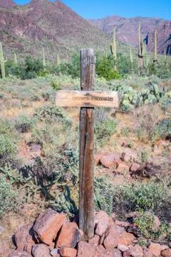 A description board for the trail in Apache Trail, Arizona Stock Photos