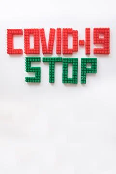 Description covid-19 of the constructor blocks on the white background Stock Photos