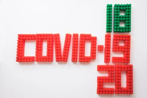 Description covid-19 of the constructor blocks on the white background Stock Photos