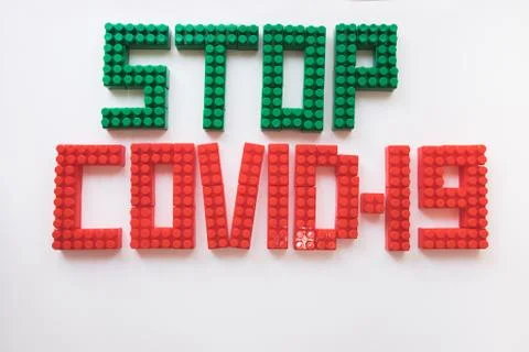 Description covid-19 of the constructor blocks on the white background Stock Photos