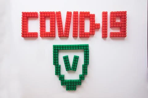Description covid-19 of the constructor blocks on the white background Stock Photos