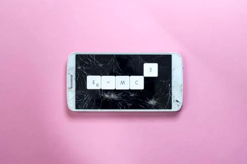 The description of Entropy with the famous formula on a broken mobile phone Stock Photos