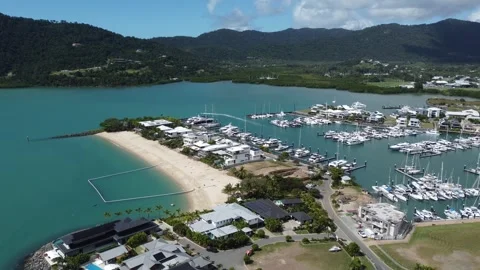 Description:
High-angle aerial shot of Boathaven Beach in Airlie Beach Stock Footage 346623969