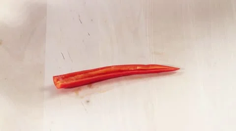 Deseeded chilli being sliced into fine strips Video stock 24673268