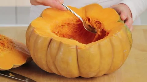 Deseeding a butternut squash Stock Footage 24667523