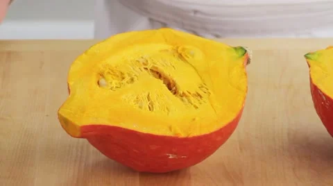 Deseeding a Hokkaido pumpkin Stock Footage 24667766