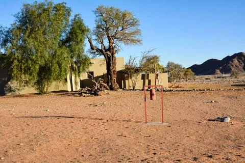 In the desert area, the house is in the background 스톡 사진