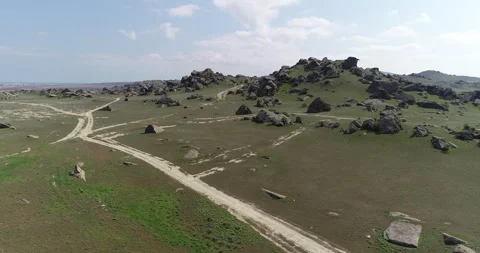 Desert area surrounded by rocks Stock Footage 262953599