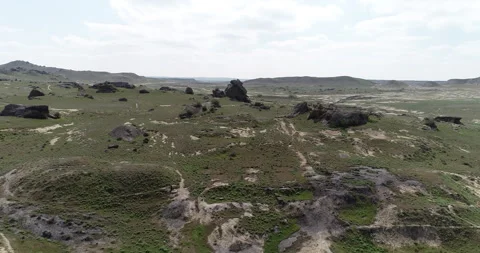 Desert area surrounded by rocks Stock Footage 262954731