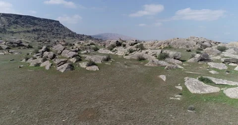 Desert area surrounded by rocks Stock Footage 262954763
