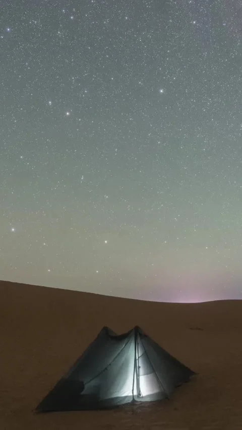 Desert camping tent under starry night sky timelapse Stock Footage 345367027