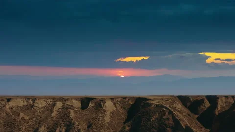 The desert canyon horizon with clouds aerial shot Stock Footage 160232103