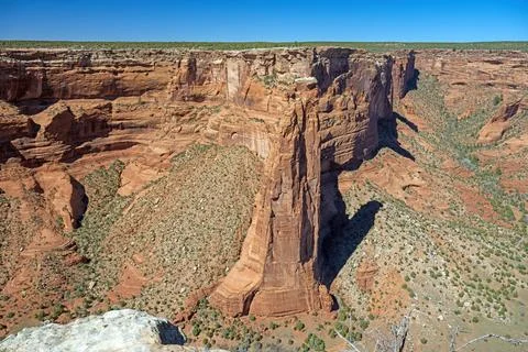Desert Canyons Separated by a Red Rock Wall Stock Photos