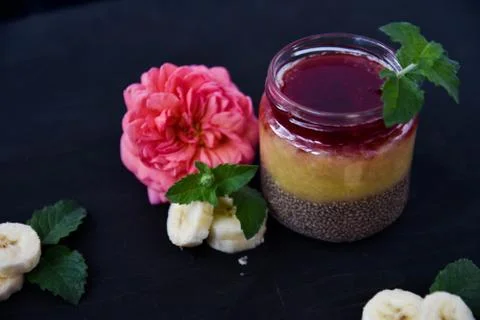 Desert chia pudding. tea rose with banana. art soft focus 스톡 사진