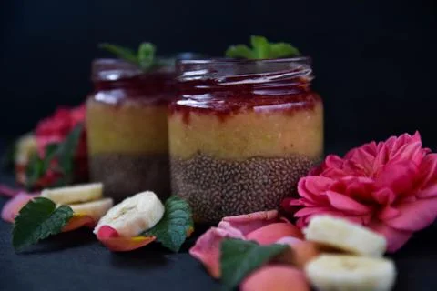 Desert chia pudding. tea rose with banana. art soft focus Stock Photos