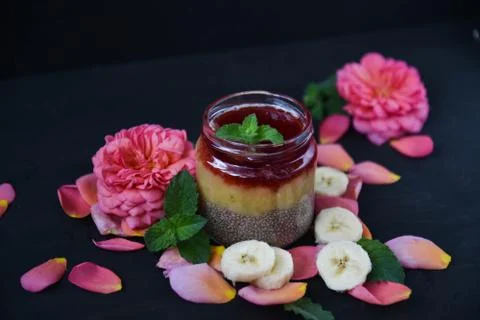 Desert chia pudding. tea rose with banana. art soft focus Stock Photos