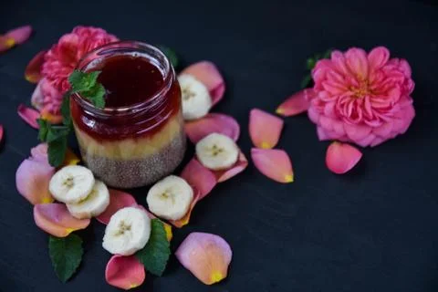 Desert chia pudding. tea rose with banana. art soft focus Stock Photos