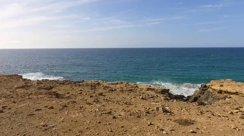 From the desert cliff to the ocean Stock Footage 92110158