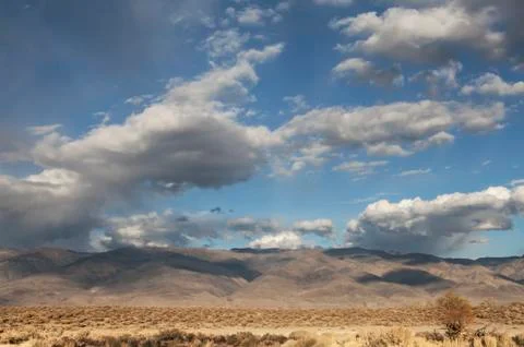 Desert clouds Stock Photos