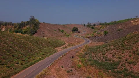 Desert Curves: Navigating the Dry Mountain Roads Stock Footage 301700240