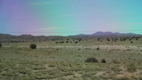 Desert drive - far hills (reverse) Stock Footage 82506116