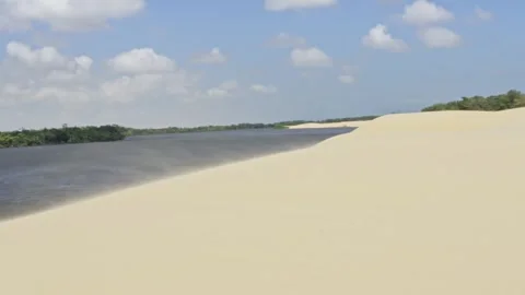 Desert Dune Landscape with River Under Sky - Barreirinhas, Brazil Stock Footage 331517435