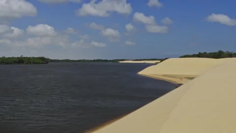 Desert Dune next to a Tropical River - Barreirinhas, Brazil Vídeos de archivo 331517437