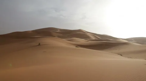 Desert dunes during a windy day. Pan view. Erg Chebbi, Morocco. Stock Footage 34446494