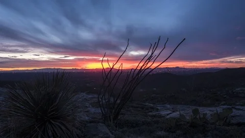Desert dusk time lapse with city lights and colorful clouds Stock Footage 84025725