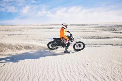 Desert dust, motorbike and man outdoor for extreme sports, adventure and travel Stock Photos