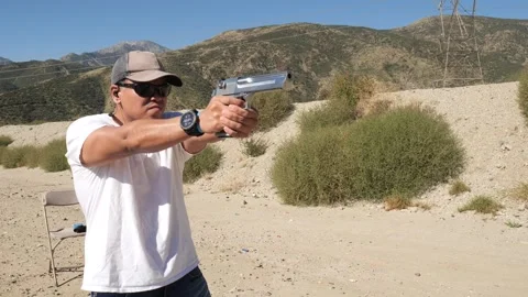 Desert Eagled fired with flash and then locks back after last round fired Stock Footage 252618074