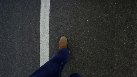 Desert Empty Highway Walk Looking from Feet Up Stock Footage 76003810