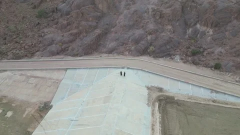 Desert Engineering: Water Management Structure in a Wide Arabian Valley Stock Footage 320823092