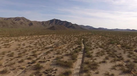 DESERT FLOOR LANDSCAPE TILT 4K Stock Footage