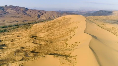 Desert, flying over a dune Stock Footage 121748869